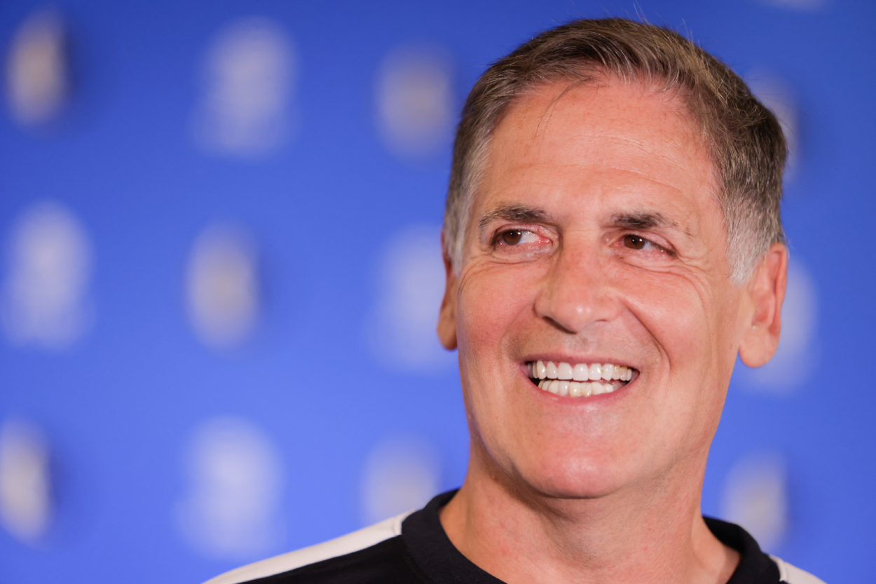 Dallas Mavericks basketball team owner Mark Cuban seen smiling at a press conference.