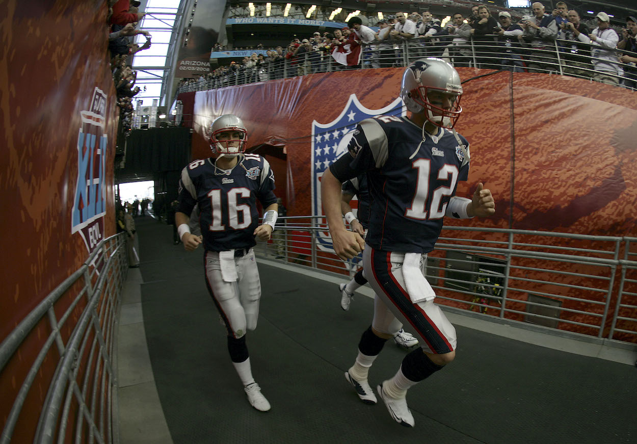 Quarterbacks Tom Brady and Matt Cassel (L) of the New England Patriots takes the field before his team takes on the New York Giants in Super Bowl XLII on February 3, 2008 at the University of Phoenix Stadium in Glendale, Arizona.