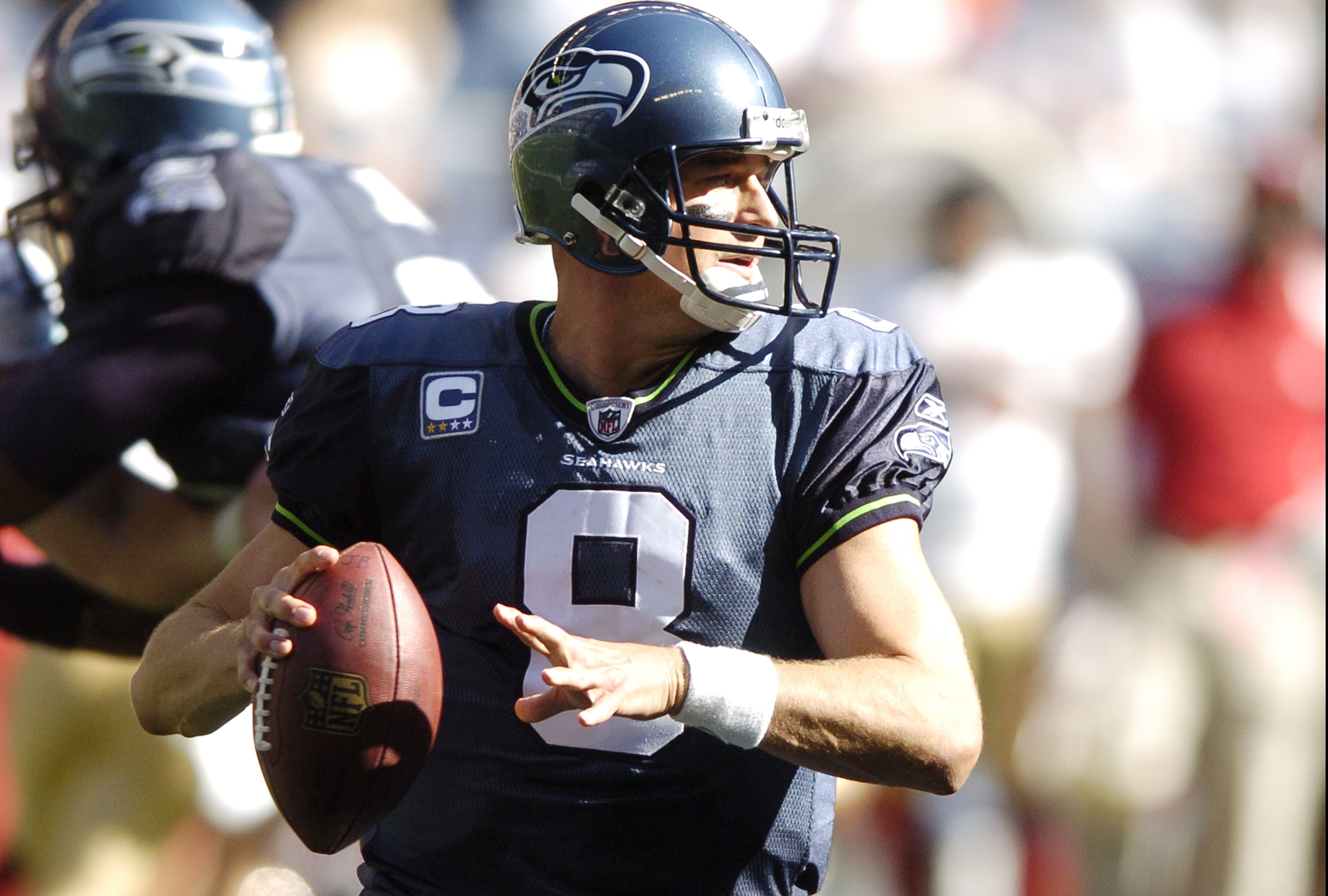 Seahawks QB Matt Hasselbeck drops back for a pass