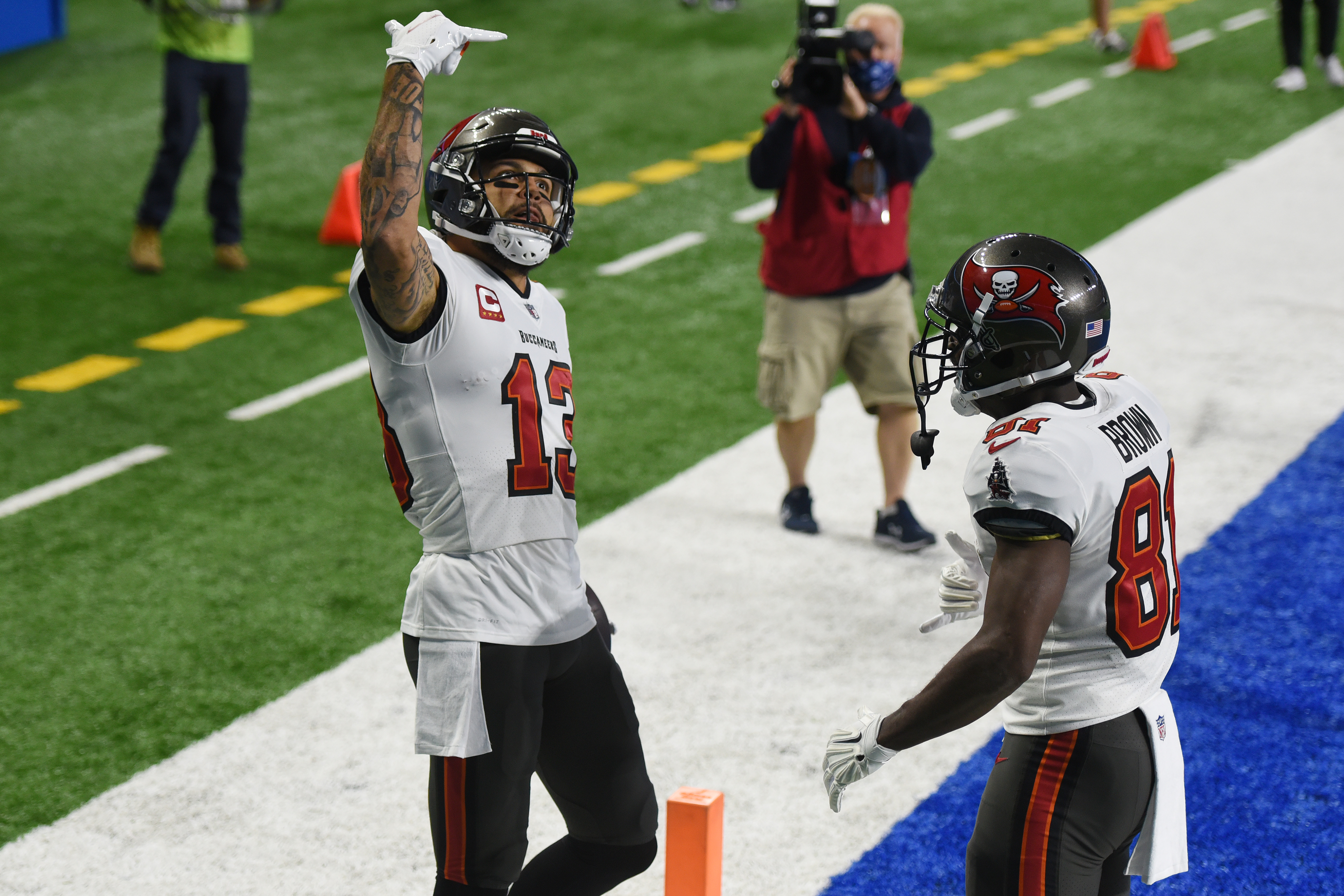 Buccaneers wide receiver Mike Evans and Antonio Brown celebrating after a touchdown