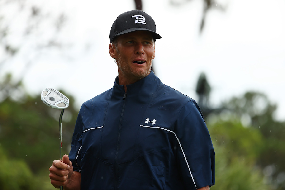 NFL player Tom Brady of the Tampa Bay Buccaneers reacts on the 11th green during The Match