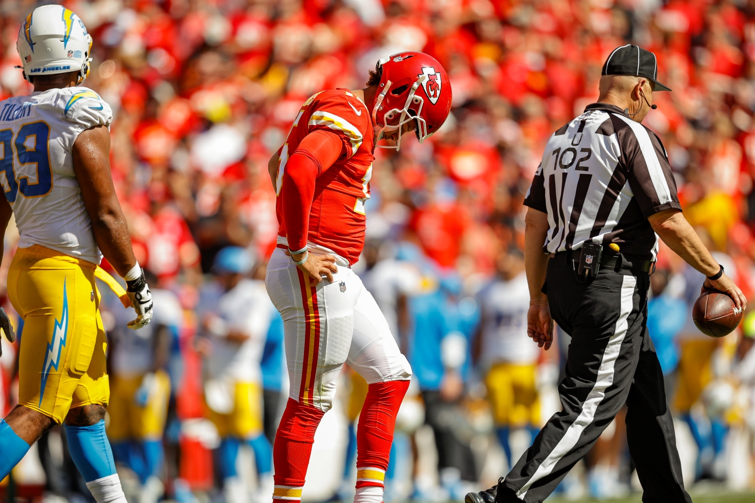 Kansas City Chiefs quarterback Patrick Mahomes walks with his head down after a play against the Los Angeles Chargers.