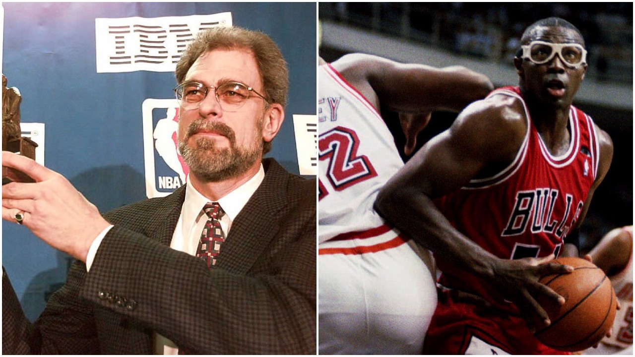 Left to Right: Former Bulls head coach Phil Jackson holds up the NBA Coach of the Year trophy and Horace Grant makes a move during a game in December 1993