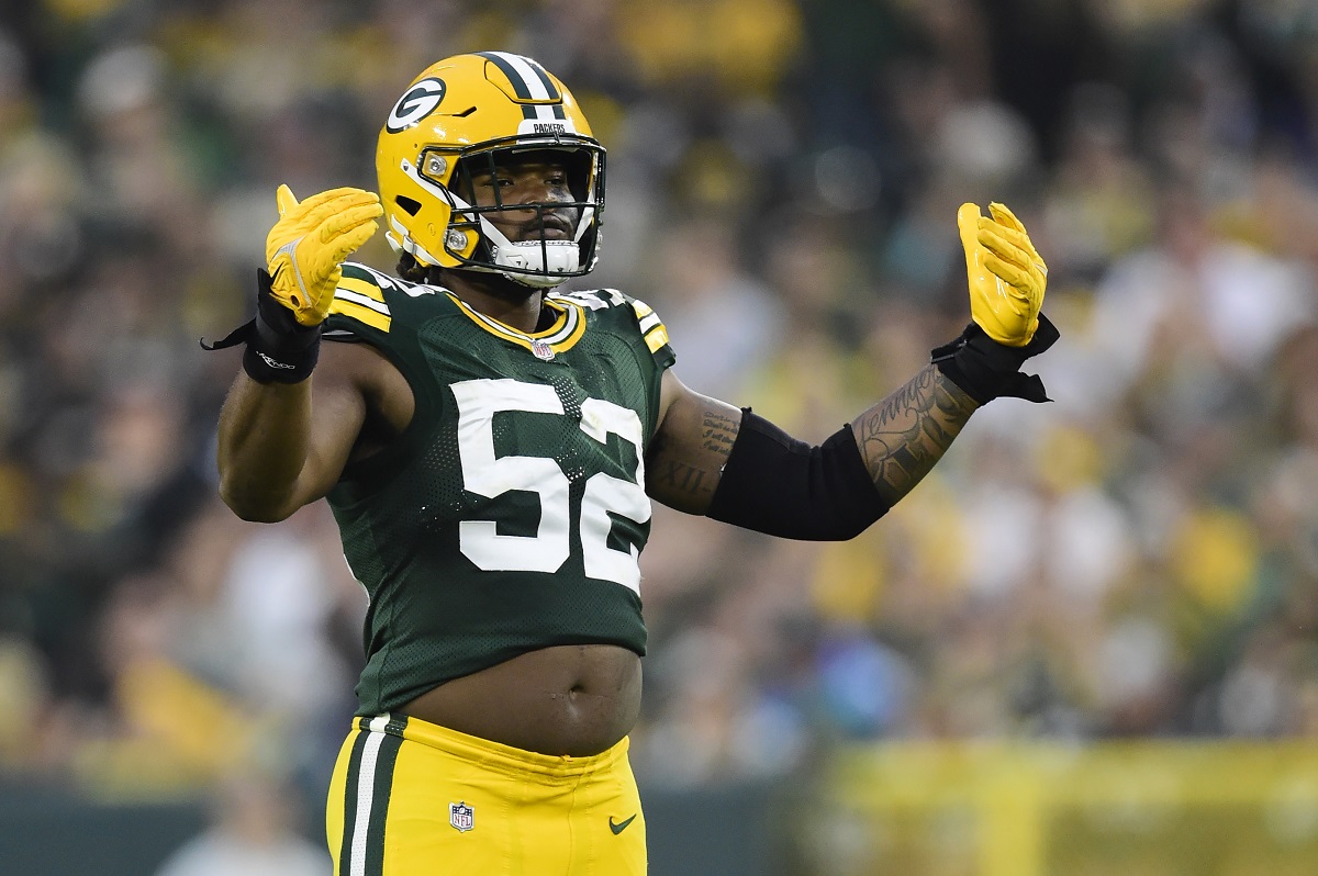 Green Bay Packers outside linebacker Rashan Gary pumps up the crowd at Lambeau Field in October 2021