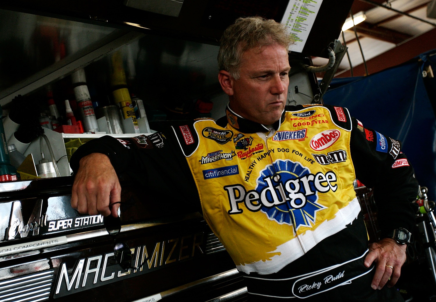 Ricky Rudd stands in the garage during practice for the NASCAR Cup Series USG Sheetrock 400 at Chicagoland Speedway on July 13, 2007 in Joliet, Illinois.