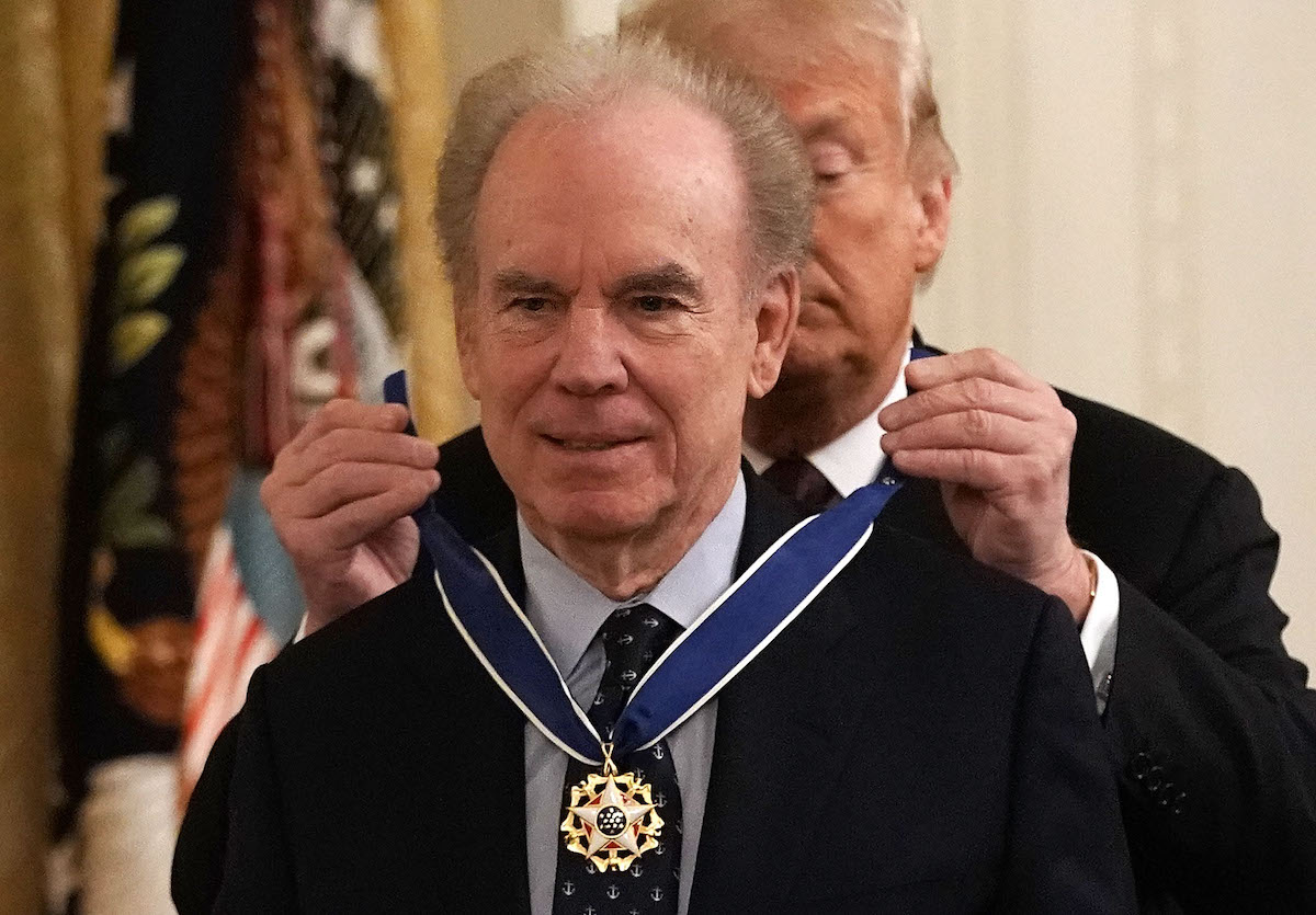 Hall of Famer Roger Staubach receives the Presidential Medal of Freedom from Donald Trump at the White House on November 16, 2018