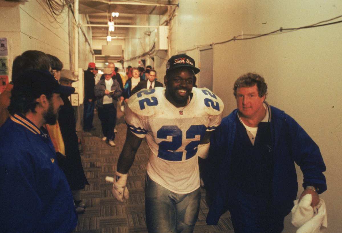 Running back Emmitt Smith of the Dallas Cowboys heads to the locker room after the 1992 NFC Championship Game