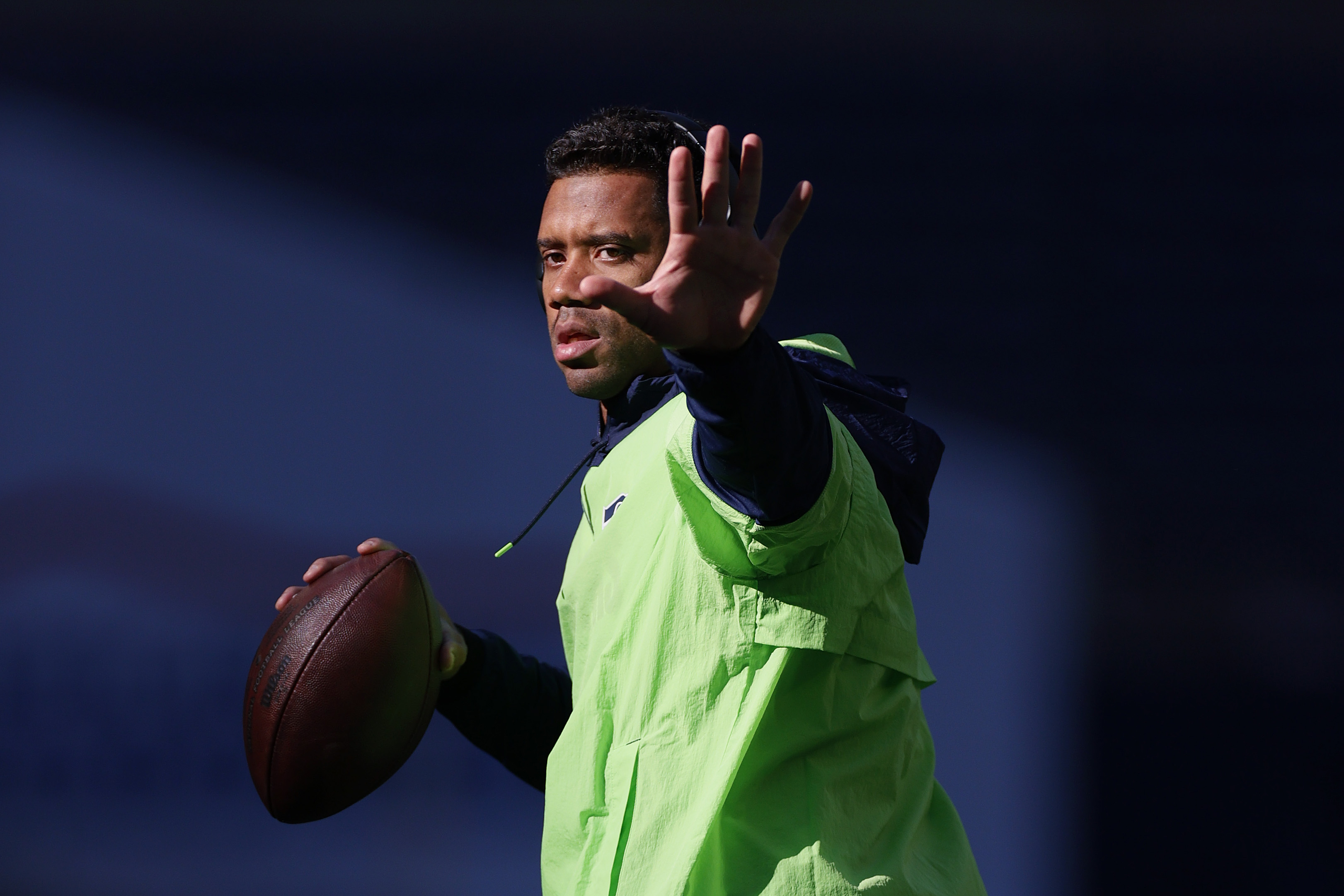 Russell Wilson of the Seattle Seahawks warms up before a game