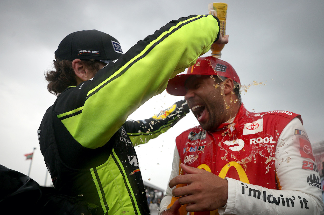 Ryan Blaney and Bubba Wallace celebrate