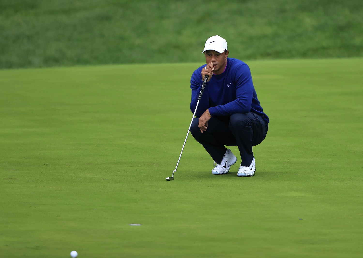 Tiger Woods lines up a putt on the 13th green during the second round of the Masters at Augusta National Golf Club on Nov. 14, 2020. | Augusta National via Getty Images