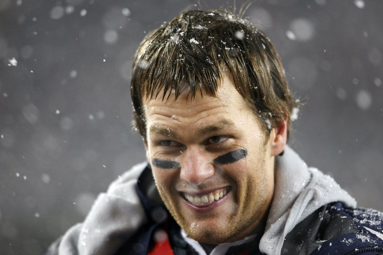 Tom Brady of the New England Patriots stands on the sideline in the fourth quarter against the Tennessee Titans on October 18, 2009 at Gillette Stadium in Foxboro, Massachusetts. The Patriots defeated the Titans 59-0.