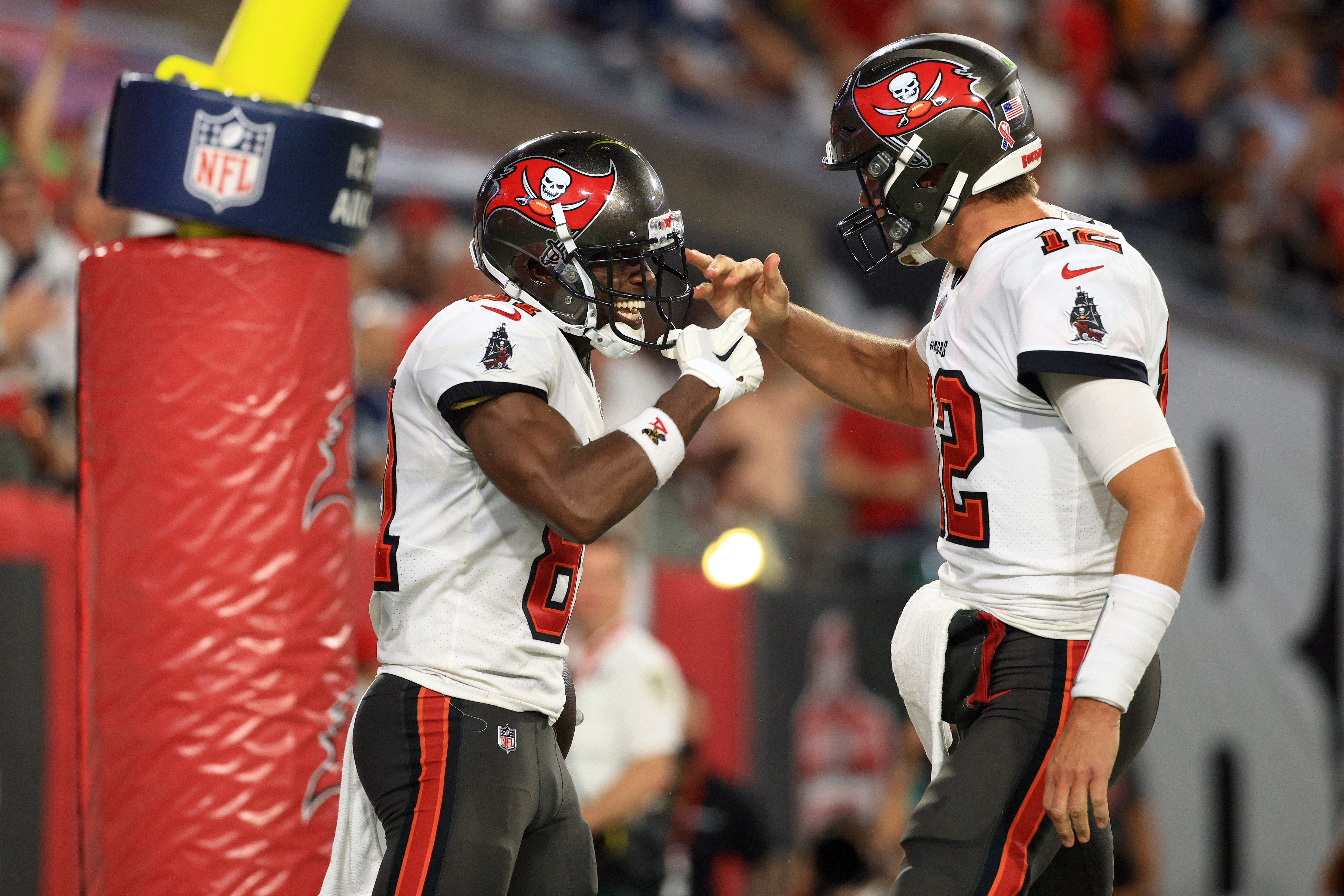 Buccaneers QB Tom Brady meets Antonio Brown in the end zone after a touchdown