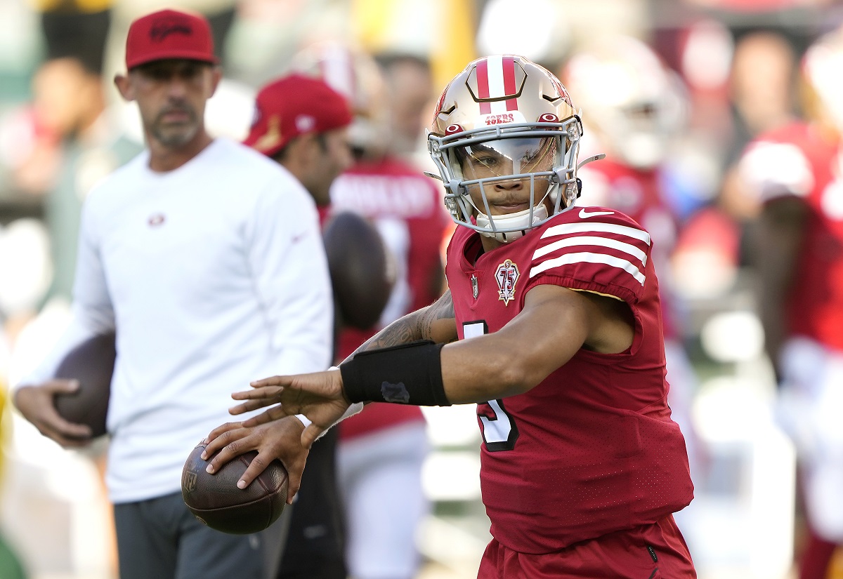 San Francisco 49ers quarterback Trey Lance is watched by his head coach Kyle Shanahan in October of 2021