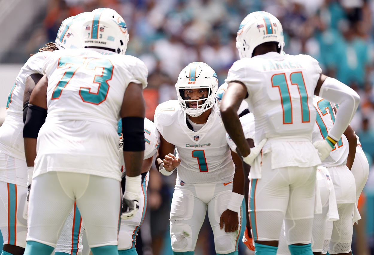 Tua Tagovailoa of the Miami Dolphins calls a play in the huddle.