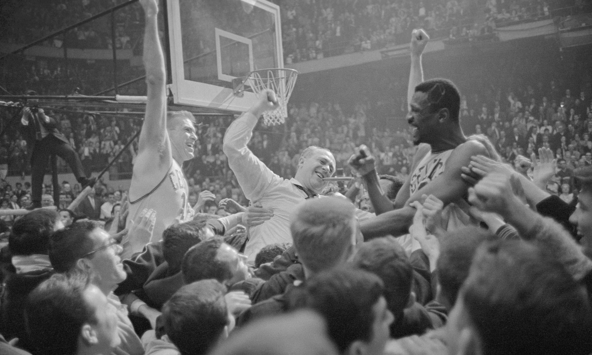 The Boston Celtics celebrate the sixth of their eight consecutive NBA championships in 1964