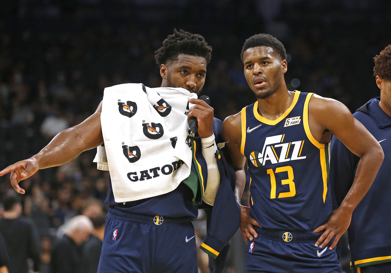 Donovan Mitchell of the Utah Jazz gives advice to rookie teammate Jared Butler.