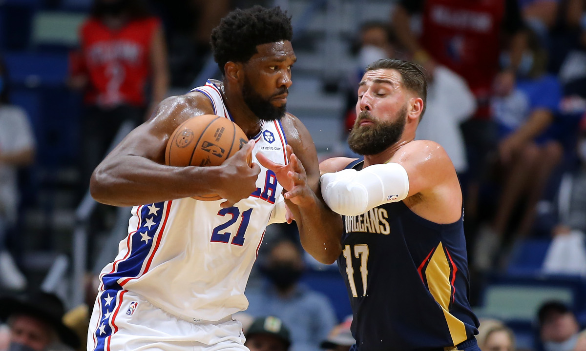Joel Embiid banged knees with Jonas Valančiūnas during the Philadelphia 76ers opening-night win, but feels pressure to keep playing through it because Ben Simmons isn't available