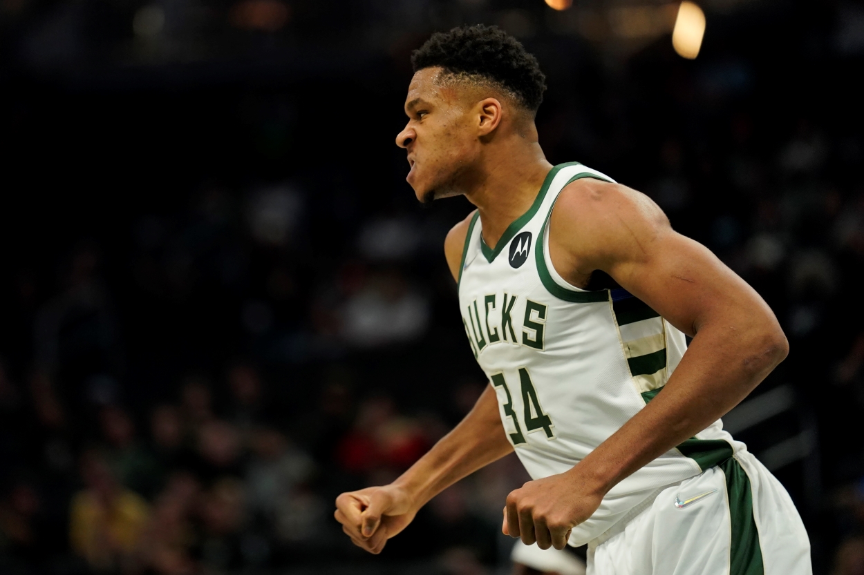 Giannis Antetokounmpo of the Milwaukee Bucks mean mugs during a preseason game.