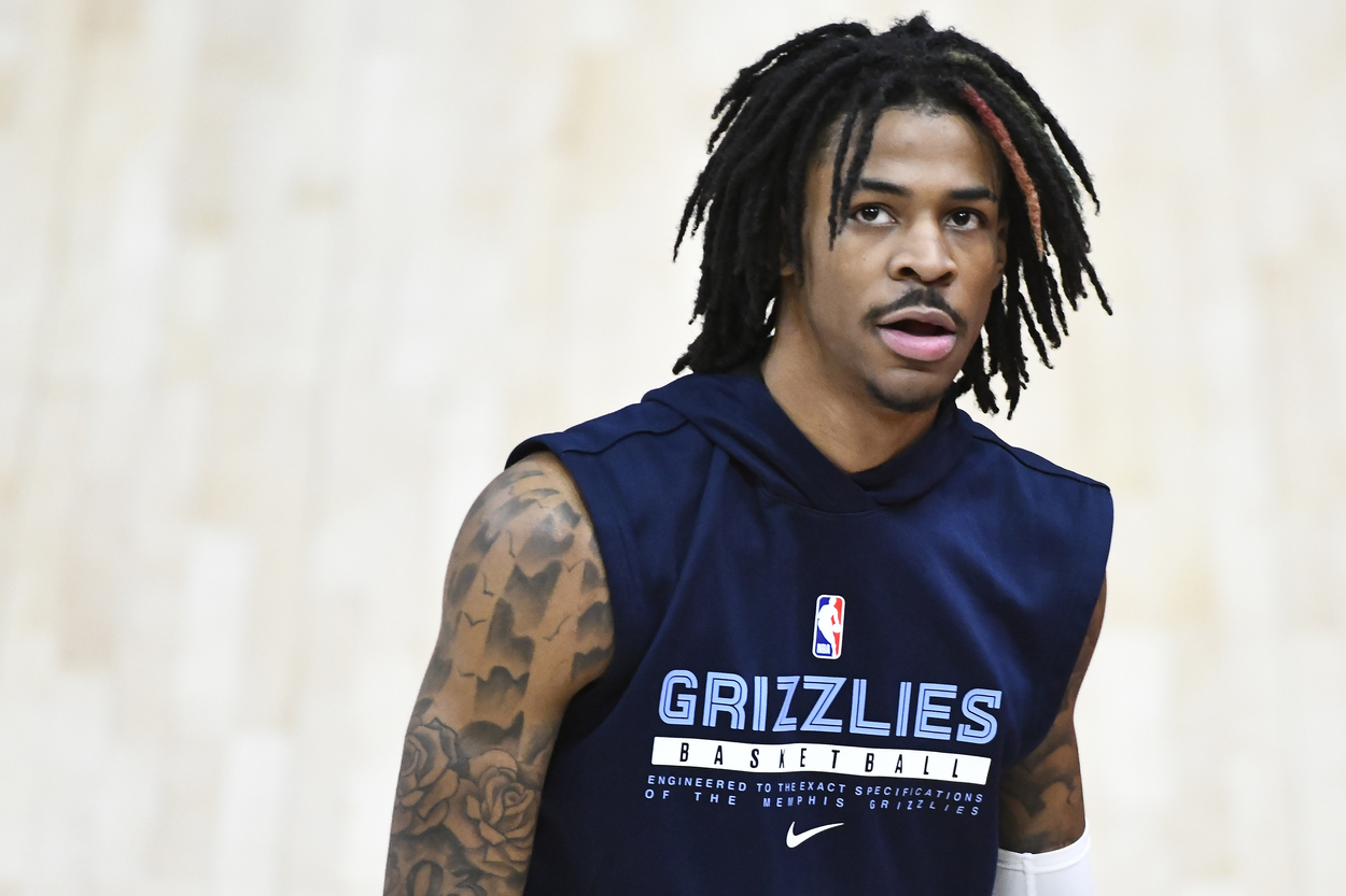 Ja Morant of the Memphis Grizzlies looks on from the court.
