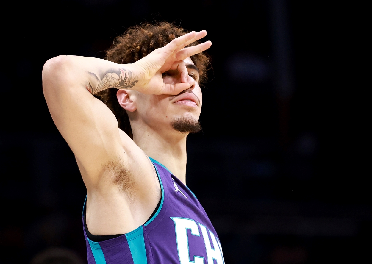LaMelo Ball of the Charlotte Hornets reacts after making a three.