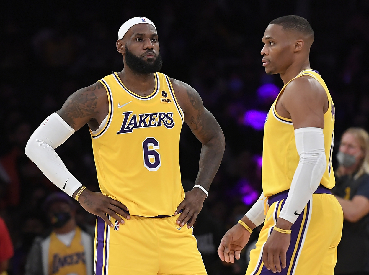 Los Angeles Lakers stars LeBron James and Russell Westbrook standing on the court.