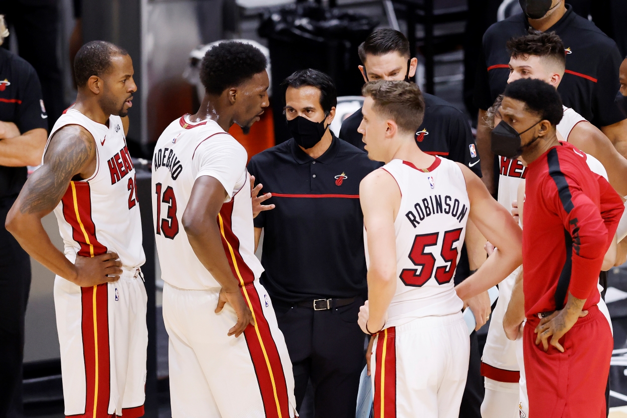 Miami Heat head coach Erik Spoelstra talks with his players.