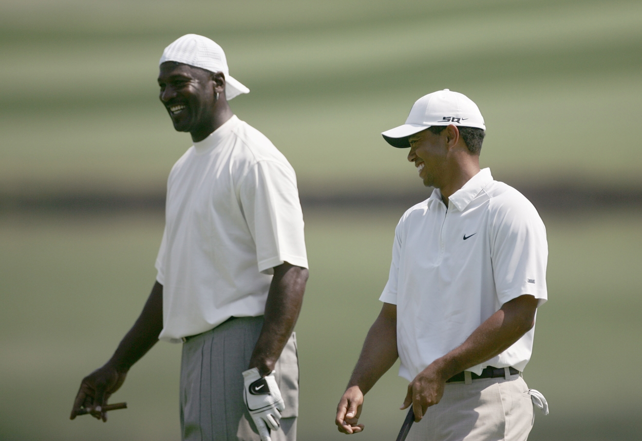 Michael Jordan and Tiger Woods together on the golf course.