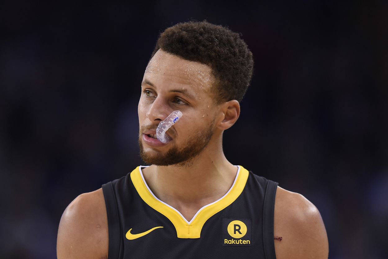 Golden State Warriors guard Stephen Curry with his signature mouthpiece.