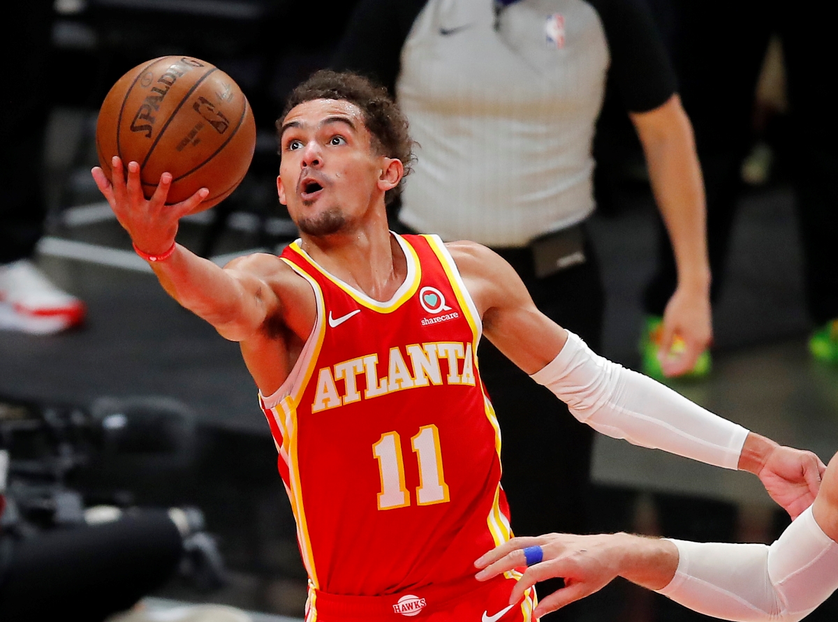 Trae Young of the Atlanta Hawks goes up for a finger roll.