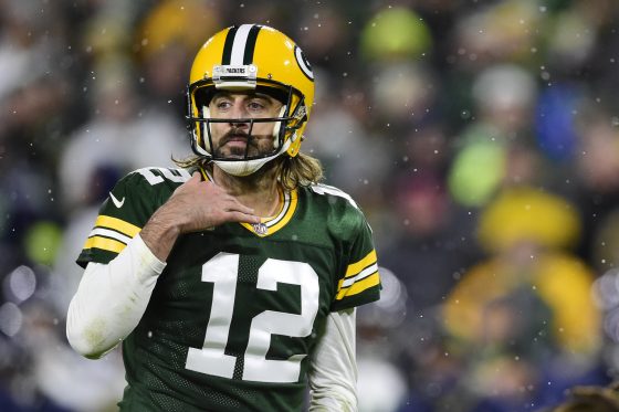 Aaron Rodgers of the Green Bay Packers calls a play at the line of scrimmage.