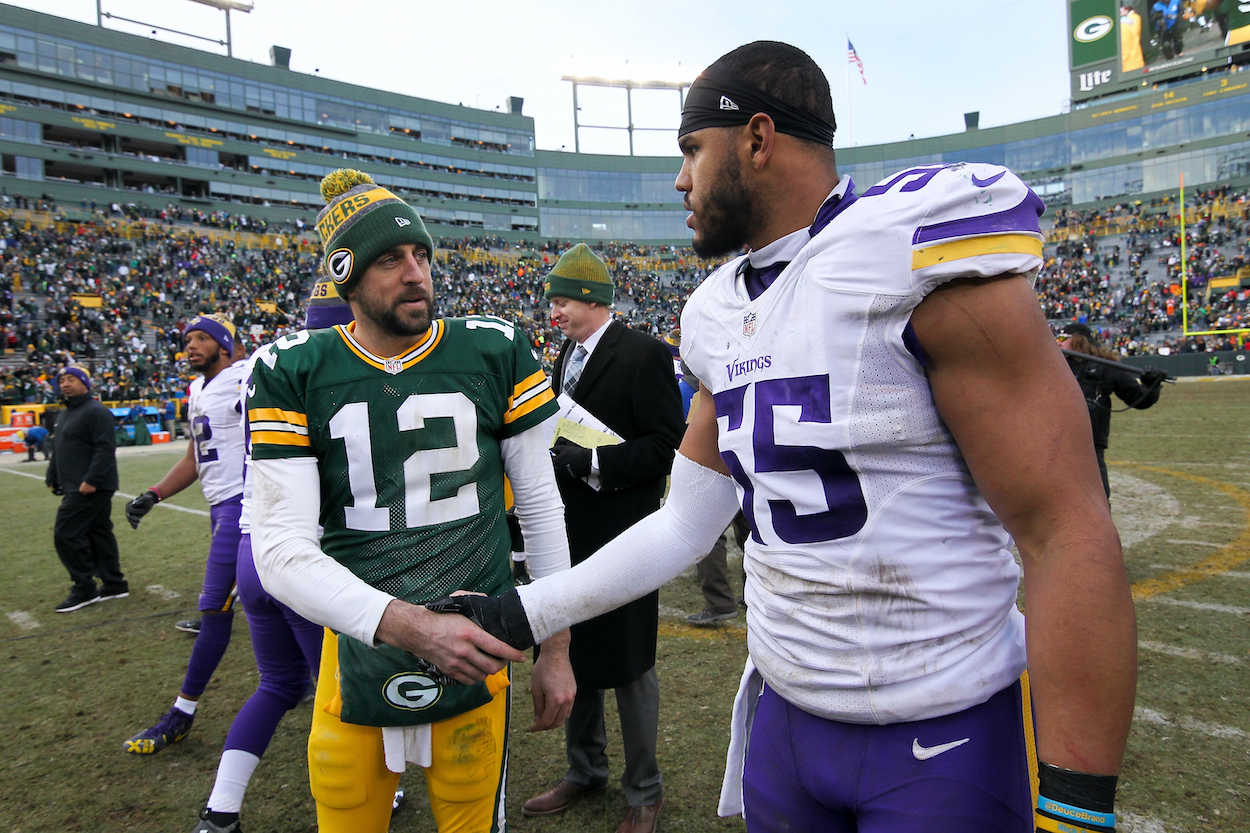 Anthony Barr of the Minnesota Vikings meets with Aaron Rodgers of the Green Bay Packers after the Green Bay Packers beat the Minnesota Vikings 38-25 at Lambeau Field on December 24, 2016 in Green Bay, Wisconsin.