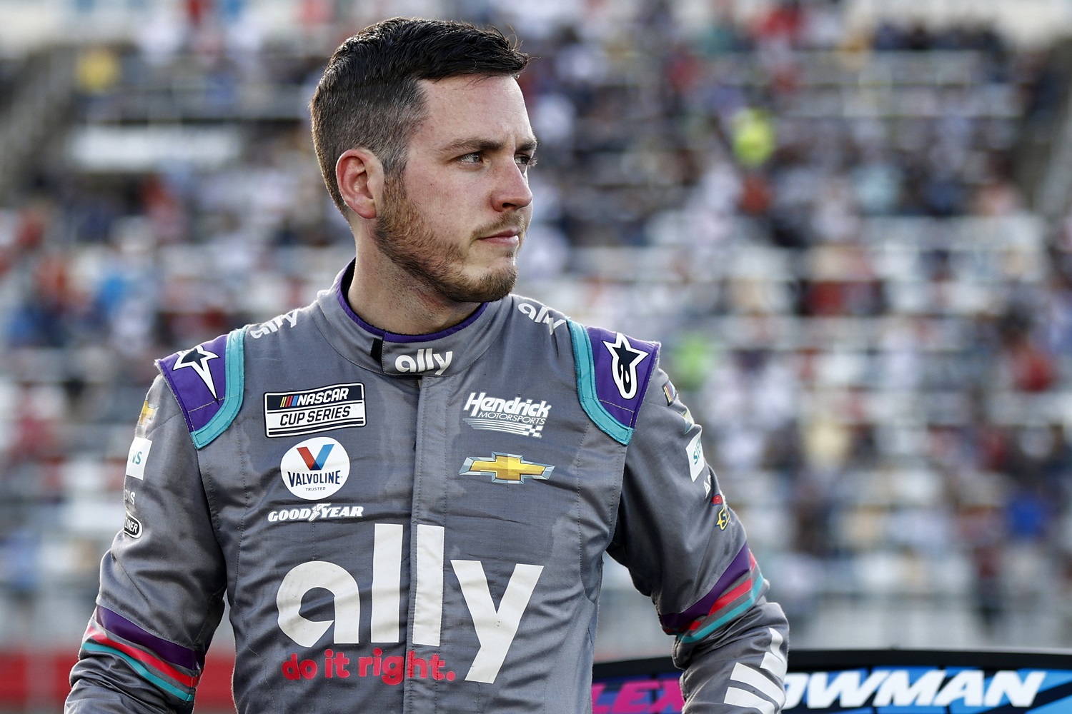 Alex Bowman, driver of the No. 48 Chevrolet, exits his car after the NASCAR Cup Series Bank of America Roval 400 at Charlotte Motor Speedway on Oct. 10, 2021.