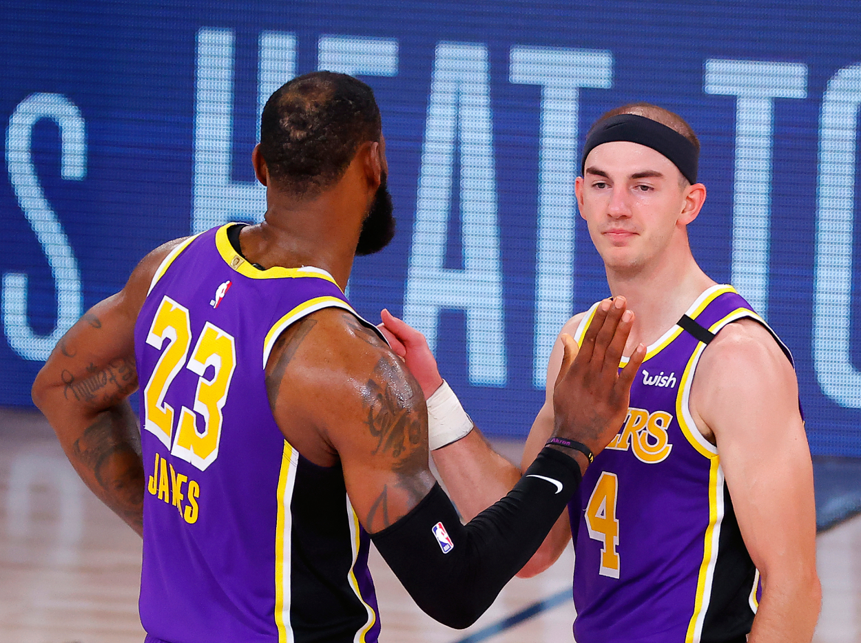 Former Lakers and current Bulls guard Alex Caruso with LeBron James.