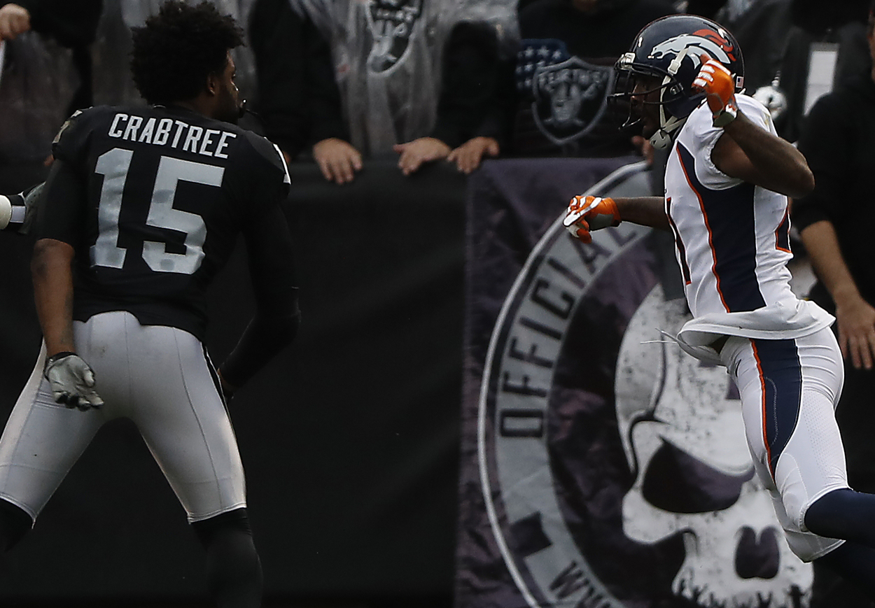 Michael Crabtree (L) and Aqib Talib in 2017.