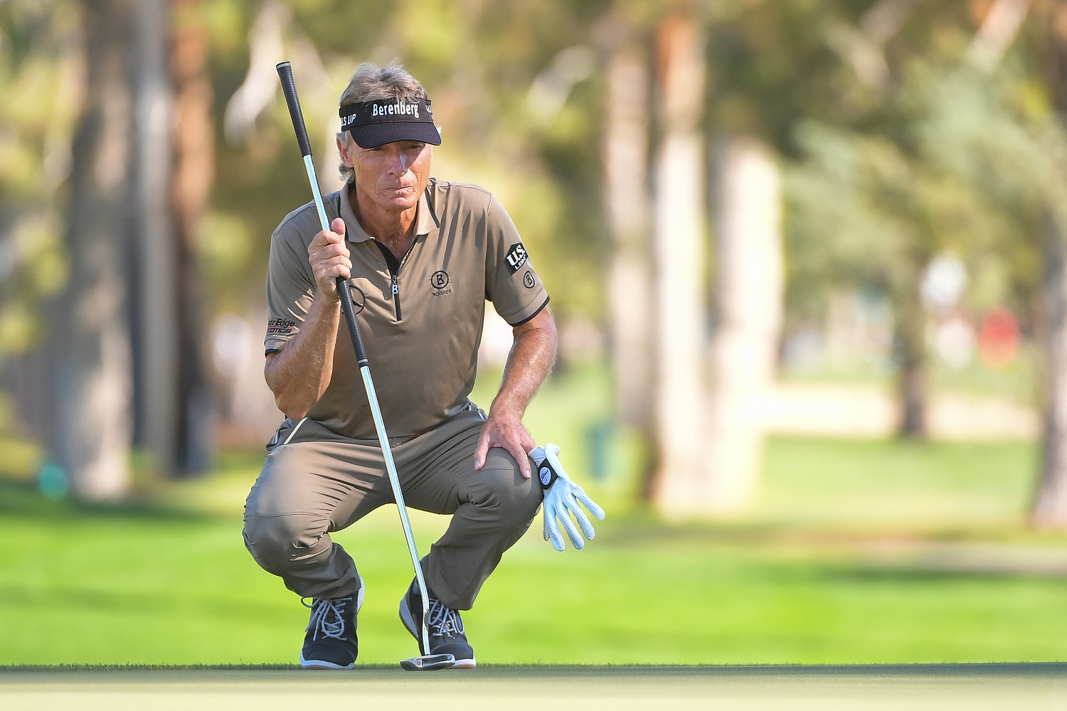 Bernhard Langer reads the ninth green during the second round of the PGA Tour Champions Charles Schwab Cup Championship at Phoenix Country Club on Nov. 12, 2021.