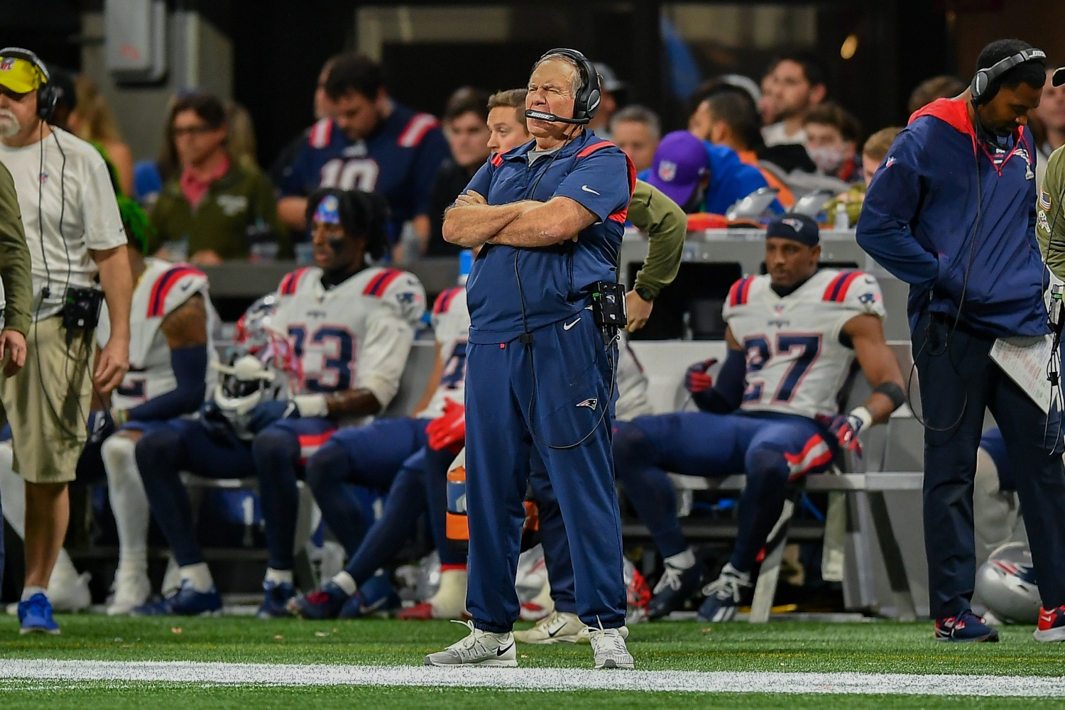 Bill Belichick watches his team play during a game between the New England Patriots and the Atlanta Falcons.
