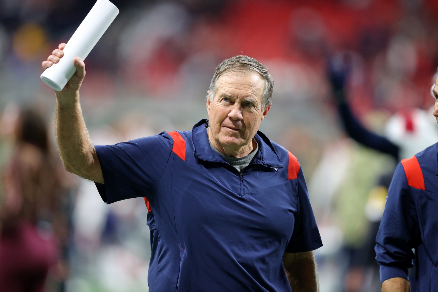 New England Patriots head coach Bill Belichick waves to the crowd after defeating the Atlanta Falcons.
