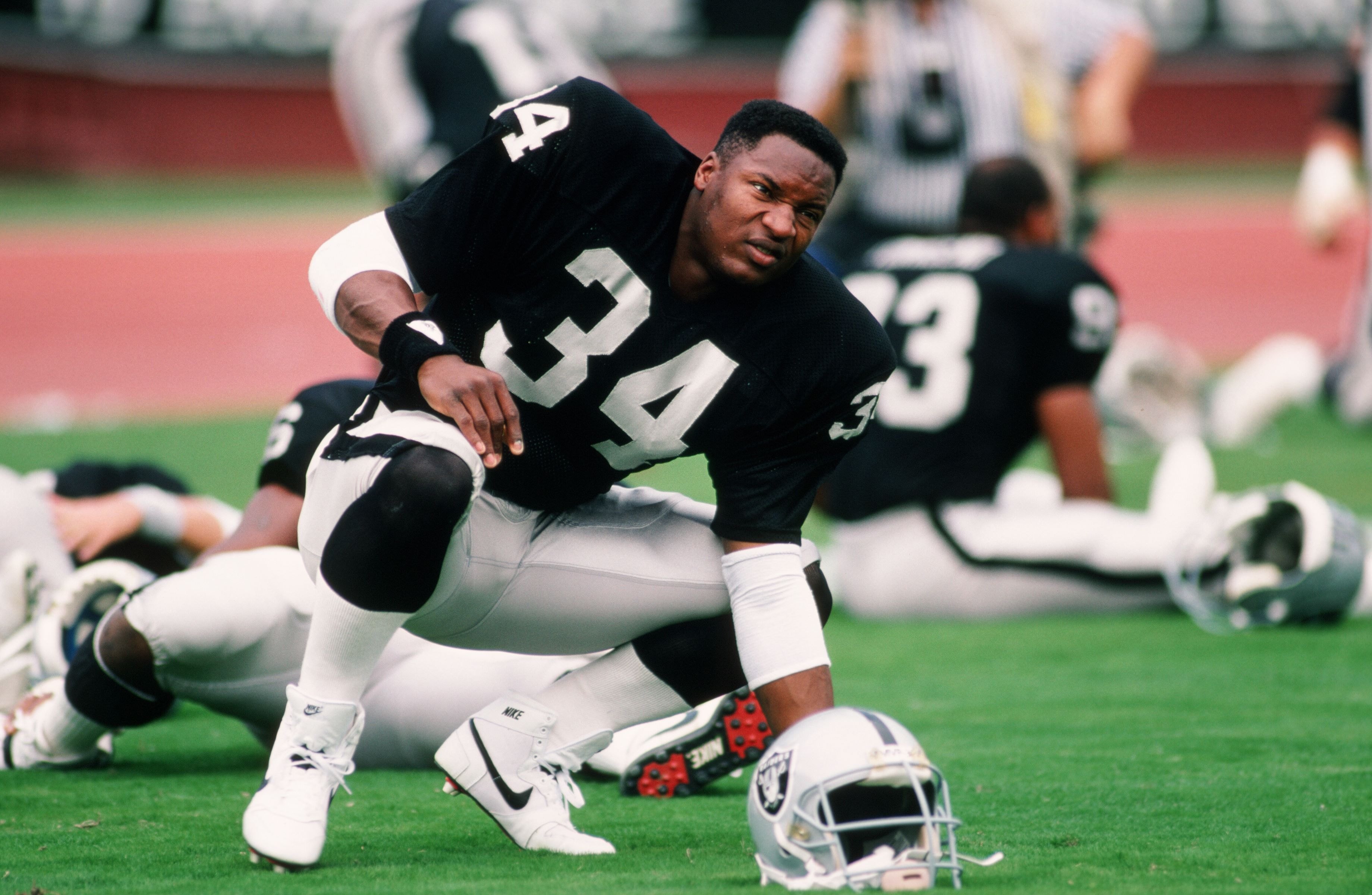 Former NFL running back Bo Jackson warming up before a game