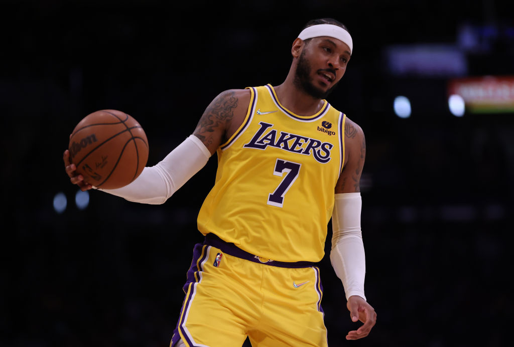 Los Angeles Lakers forward Carmelo Anthony dribbles the ball during NBA action.