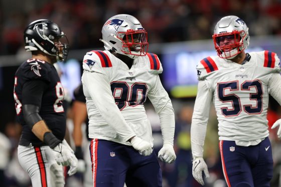 New England Patriots defensive lineman Christian Barmore celebrates making a tackle against the Atlanta Falcons.