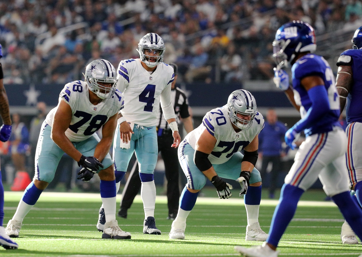 Dak Prescott prepares to take a snap as the Dallas Cowboys play the New York Giants.