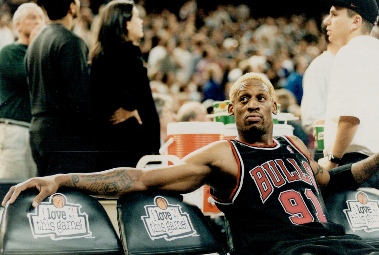 Dennis Rodman of the San Antonio Spurs looks on during a NBA