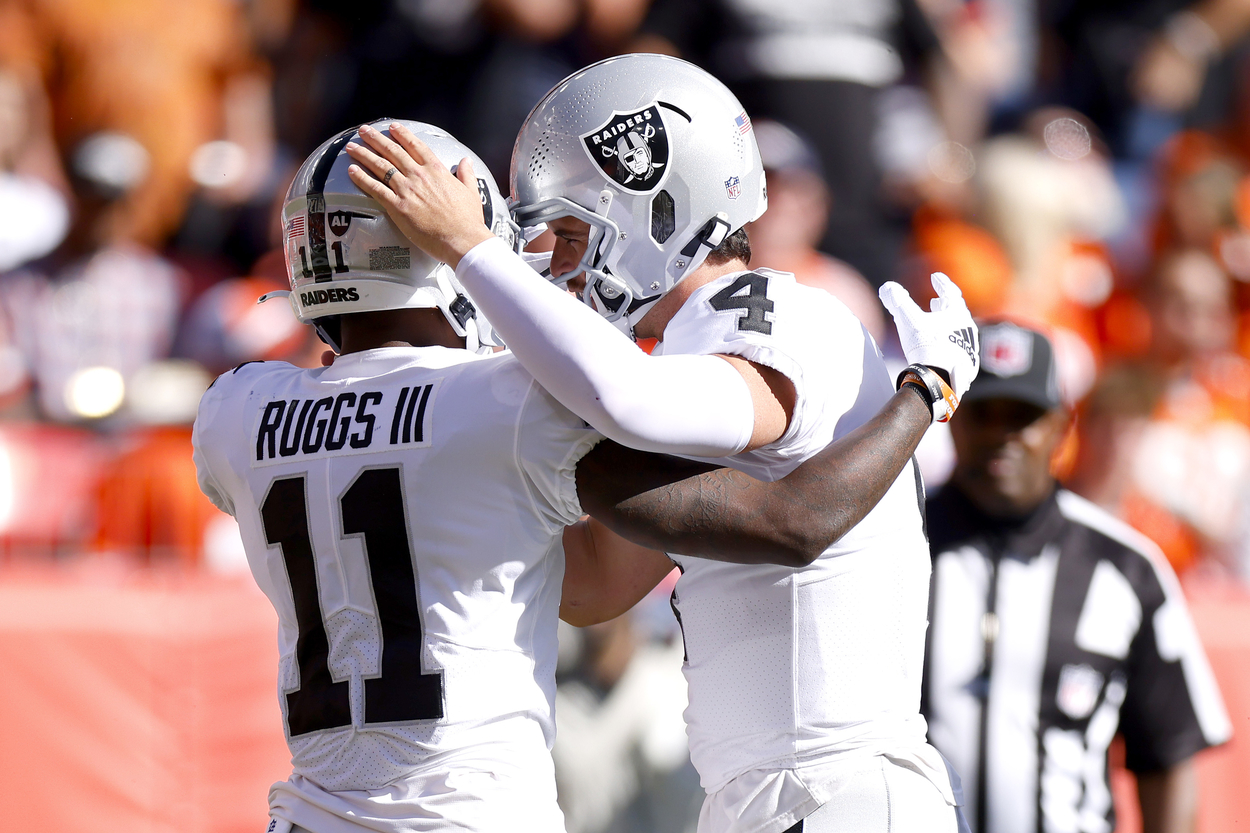 Las Vegas Raiders quarterback Derek Carr and receiver Henry Ruggs in 2021.