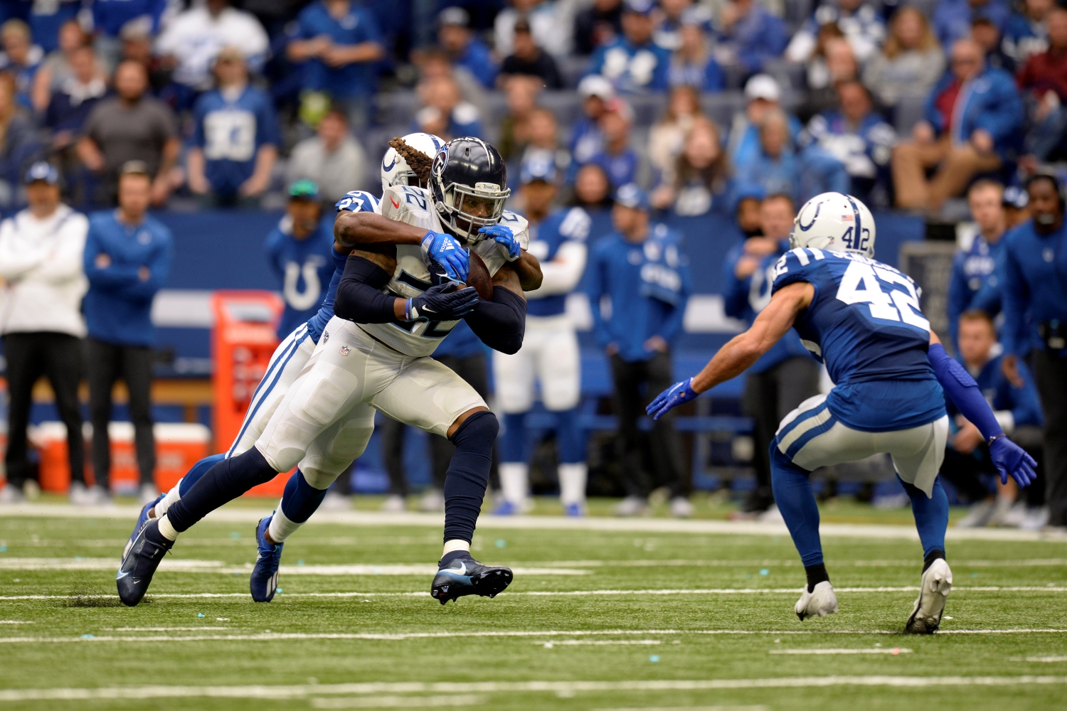 Indianapolis Colts safety Andrew Sendejo gets into position as Tennessee Titans Running Back Derrick Henry is tackled by Xavier Rhodes.