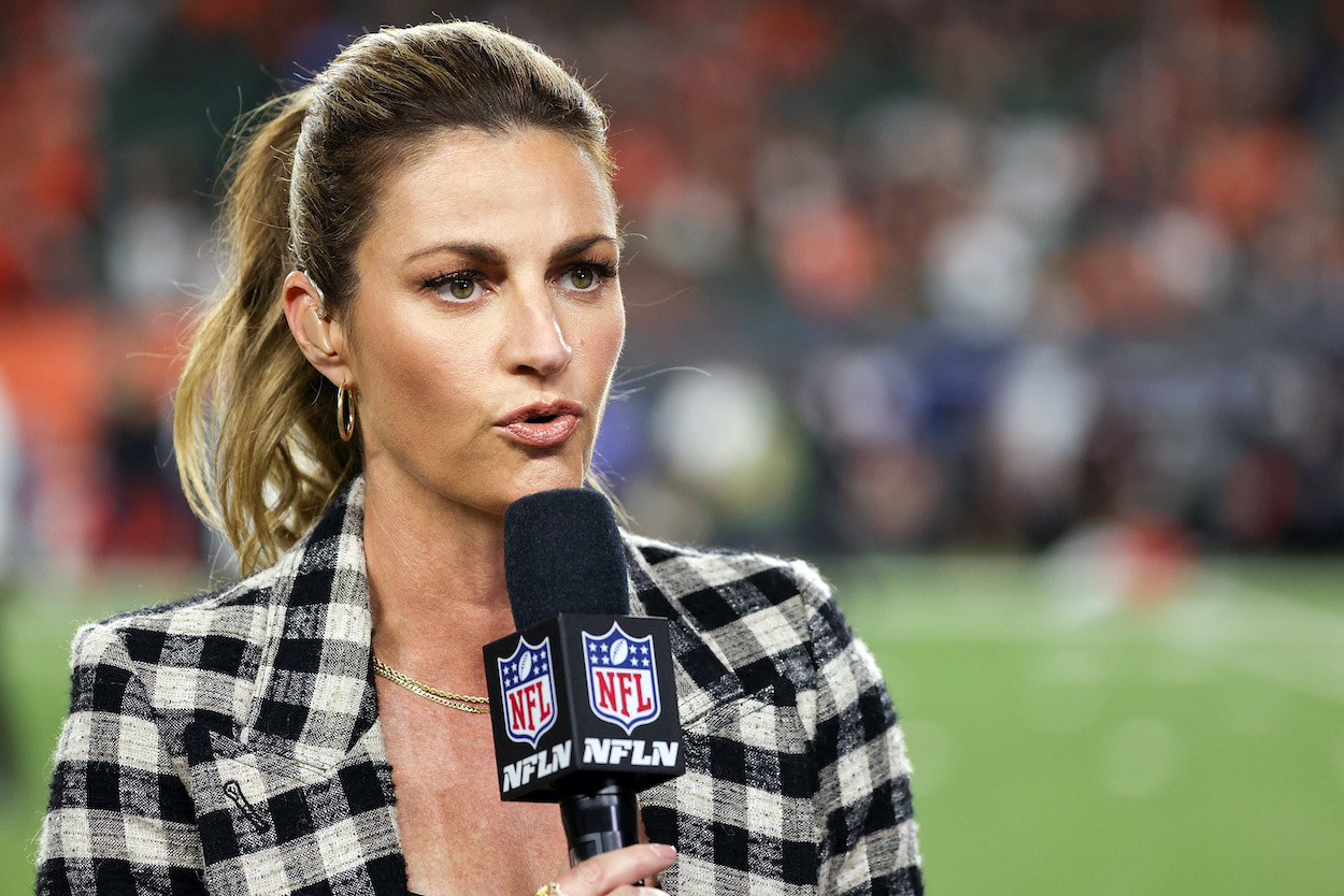 Wearing a checkered blazer, Erin Andrews reports before a game between the Jacksonville Jaguars and Cincinnati Bengals in 2021