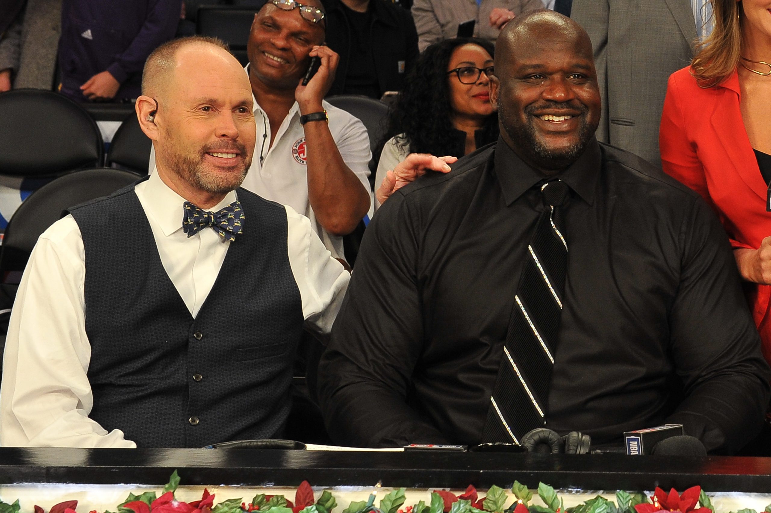 Ernie Johnson Jr. (L) and Shaquille O'Neal attend a basketball game between the Los Angeles Lakers and the Minnesota Timberwolves.