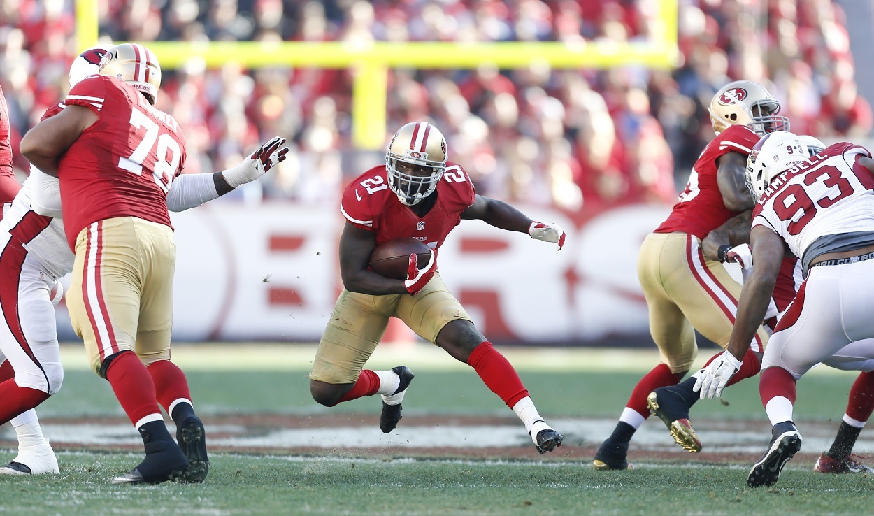 Frank Gore running for the 49ers