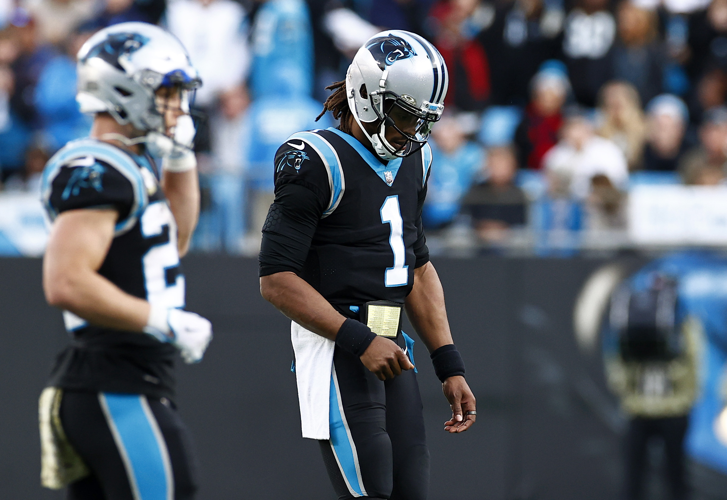Carolina Panthers RB Christian McCaffrey and Qb Cam Newton.