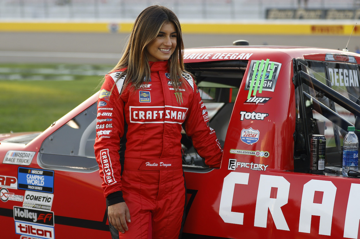 Hailie Deegan waits on grid