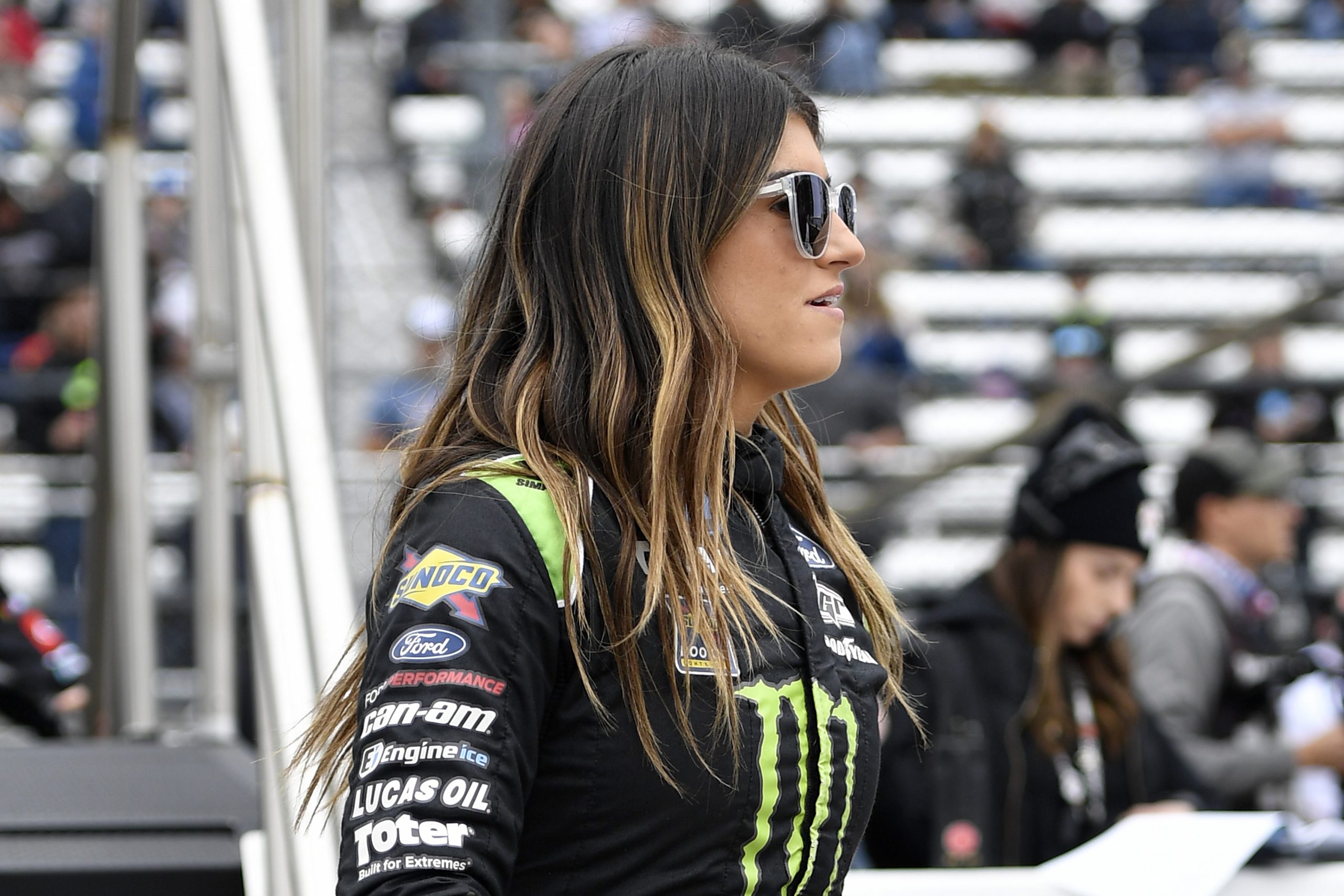 Hailie Deegan, driver of the No. 1 Ford, walks on stage during ceremonies prior to the NASCAR Camping World Truck Series United Rentals 200 at Martinsville Speedway on Oct. 30, 2021 in Martinsville, Virginia.